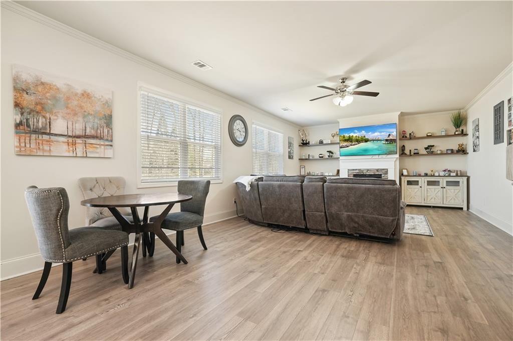 66 Snowdon Way Villa Rica, GA 30180 - Photo 17 of 52 a living room with furniture and a wooden floor
