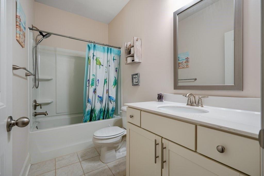 66 Snowdon Way Villa Rica, GA 30180 - Photo 23 of 52 a bathroom with a sink a toilet and shower
