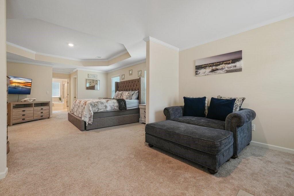 66 Snowdon Way Villa Rica, GA 30180 - Photo 35 of 52 a living room with furniture and a flat screen tv