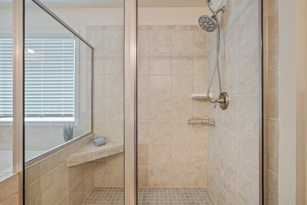 66 Snowdon Way Villa Rica, GA 30180 - Photo 40 of 52 a bathroom with a bathtub and shower