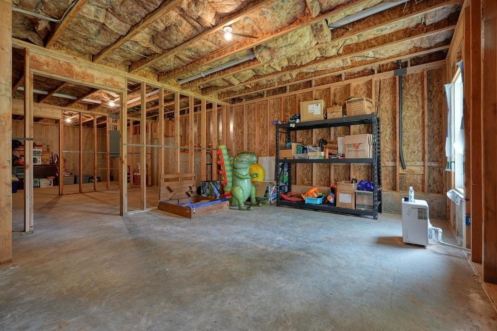 66 Snowdon Way Villa Rica, GA 30180 - Photo 42 of 52 a view of a garage with couch