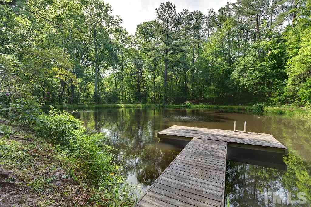 5401 Couch Mountain Road Durham, NC 27705 - Photo 25 of 25 Your private dock, on your own private and stocked pond. Rare find only minutes to UNC, Duke, and RTP. Entirely fenced with gated entry, this is a private oasis.