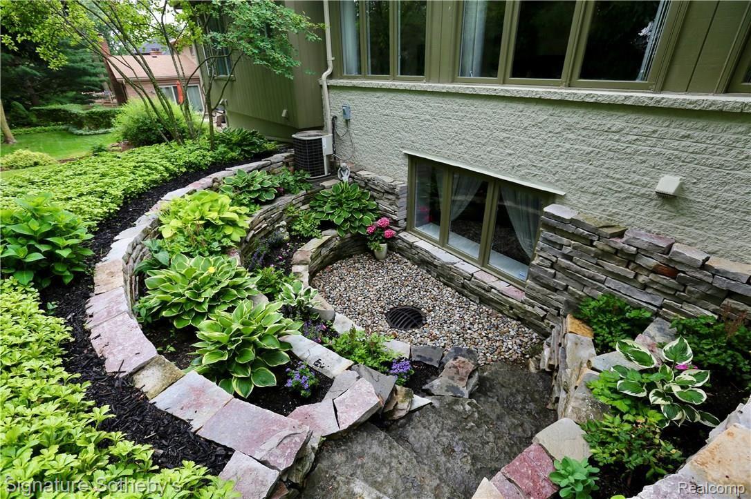 731 Stanford Circle Rochester, MI 48309 - Photo 48 of 52 Tiered Landscaping to Lower Level