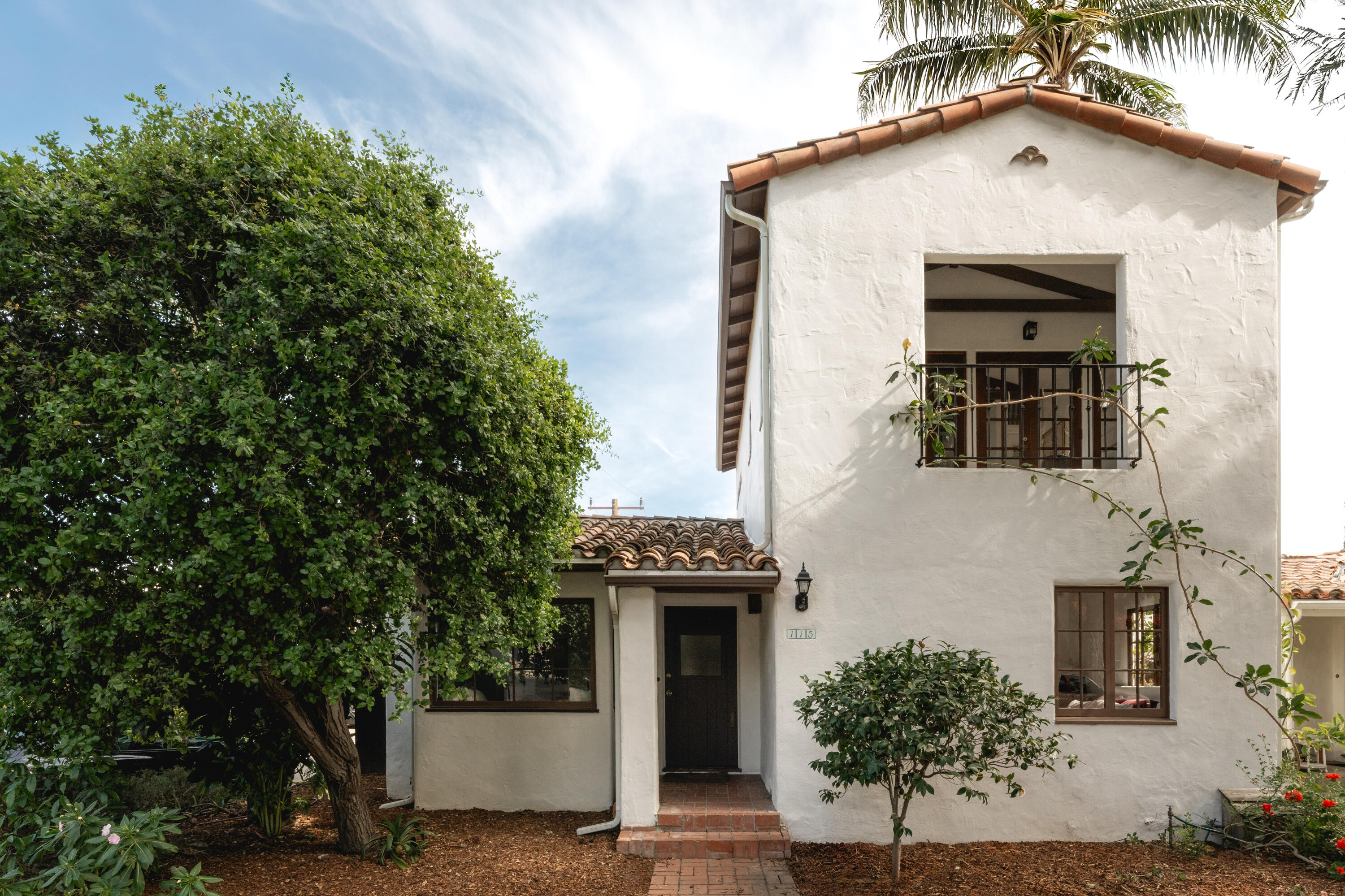 115 West Junipero Street Santa Barbara, CA 93105 - Photo 1 of 30 a front view of a house with a garden