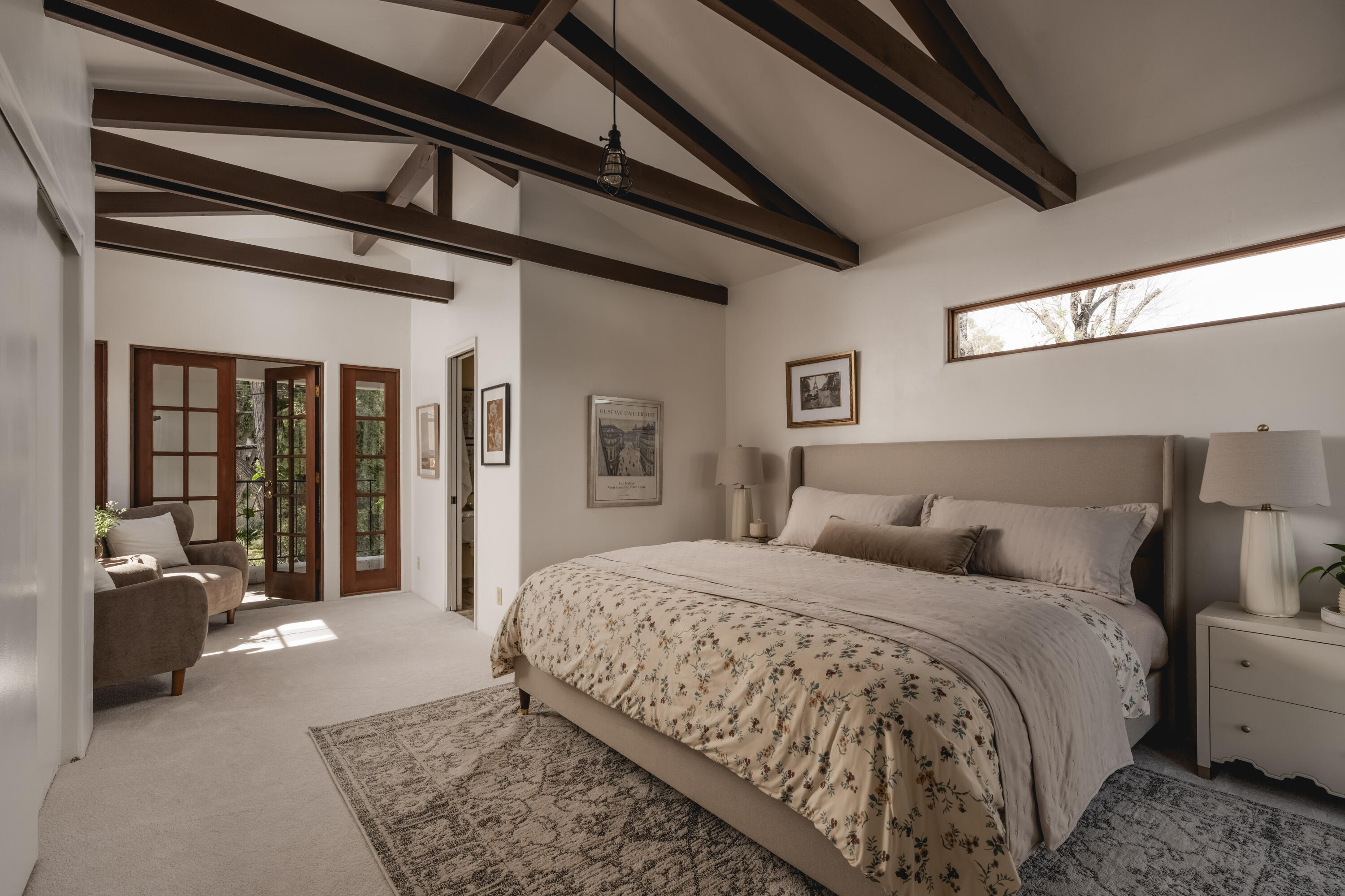 115 West Junipero Street Santa Barbara, CA 93105 - Photo 16 of 30 a large bedroom with a bed and glass door