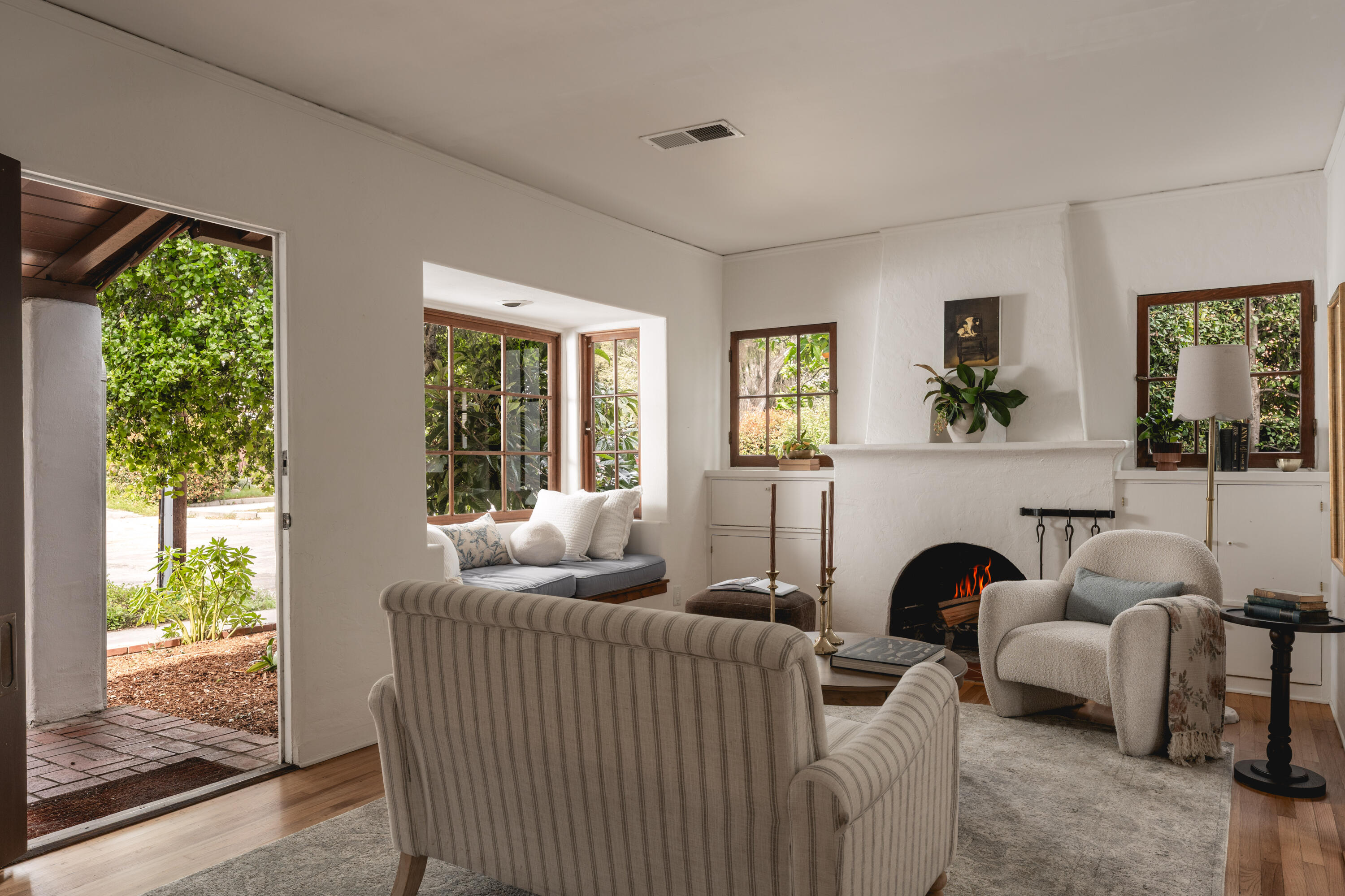 115 West Junipero Street Santa Barbara, CA 93105 - Photo 4 of 30 a living room with furniture and a floor to ceiling window