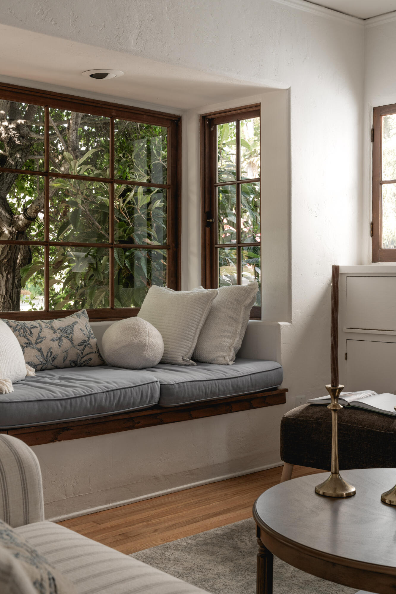 115 West Junipero Street Santa Barbara, CA 93105 - Photo 5 of 30 a living room with a couch and a large window