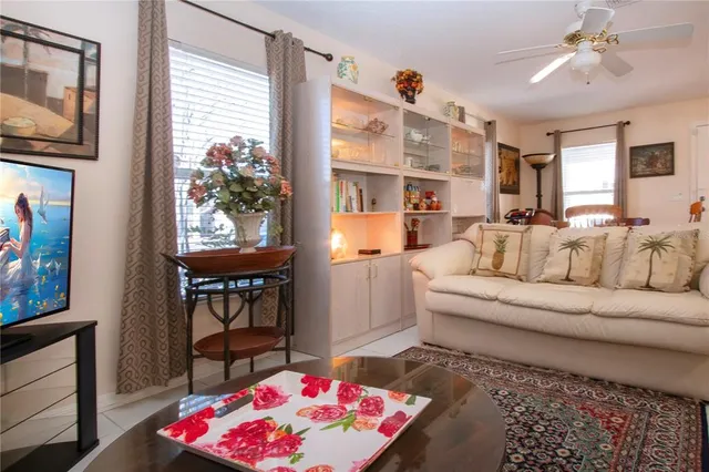 a bedroom with bed and cabinet