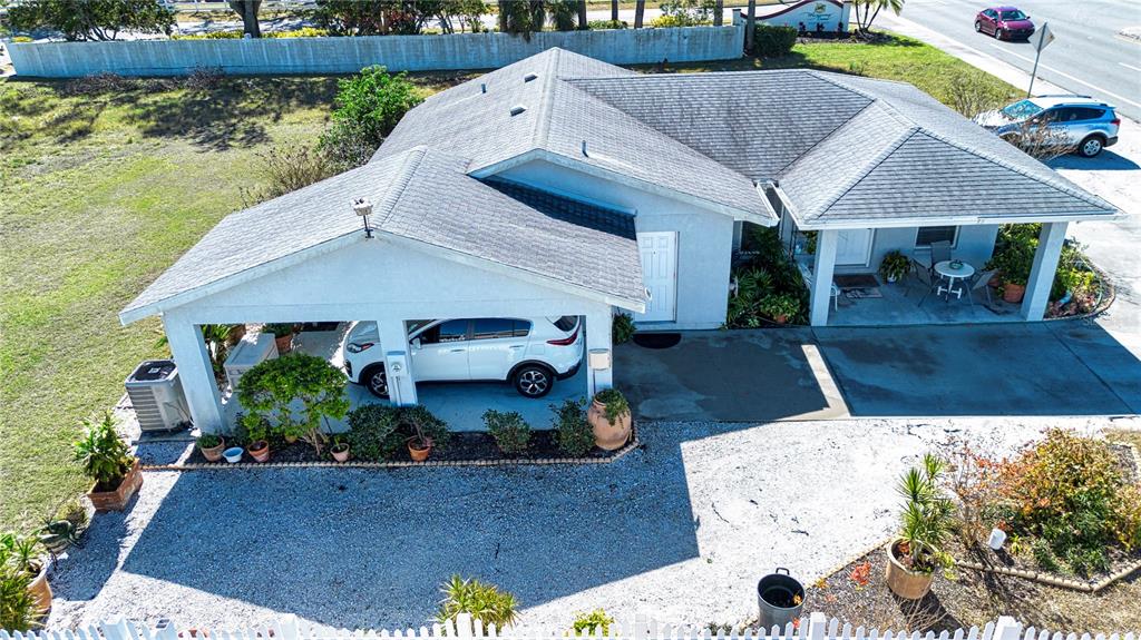 4010 North Lockwood Ridge Road Sarasota, FL 34235 - Photo 5 of 64 an aerial view of a house with swimming pool and patio