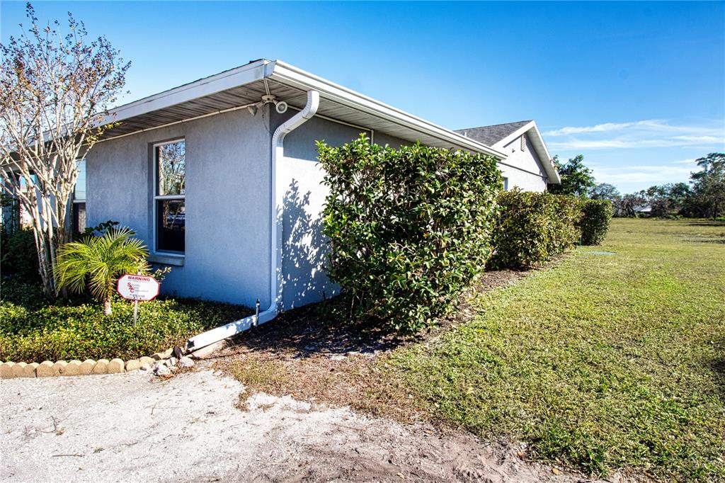 4010 North Lockwood Ridge Road Sarasota, FL 34235 - Photo 60 of 64 a view of a back yard of the house