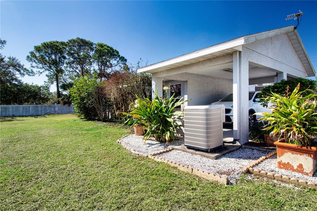 4010 North Lockwood Ridge Road Sarasota, FL 34235 - Photo 61 of 64 a front view of a house with garden