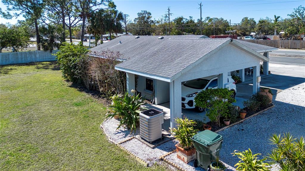 4010 North Lockwood Ridge Road Sarasota, FL 34235 - Photo 63 of 64 a view of a house with yard and sitting area