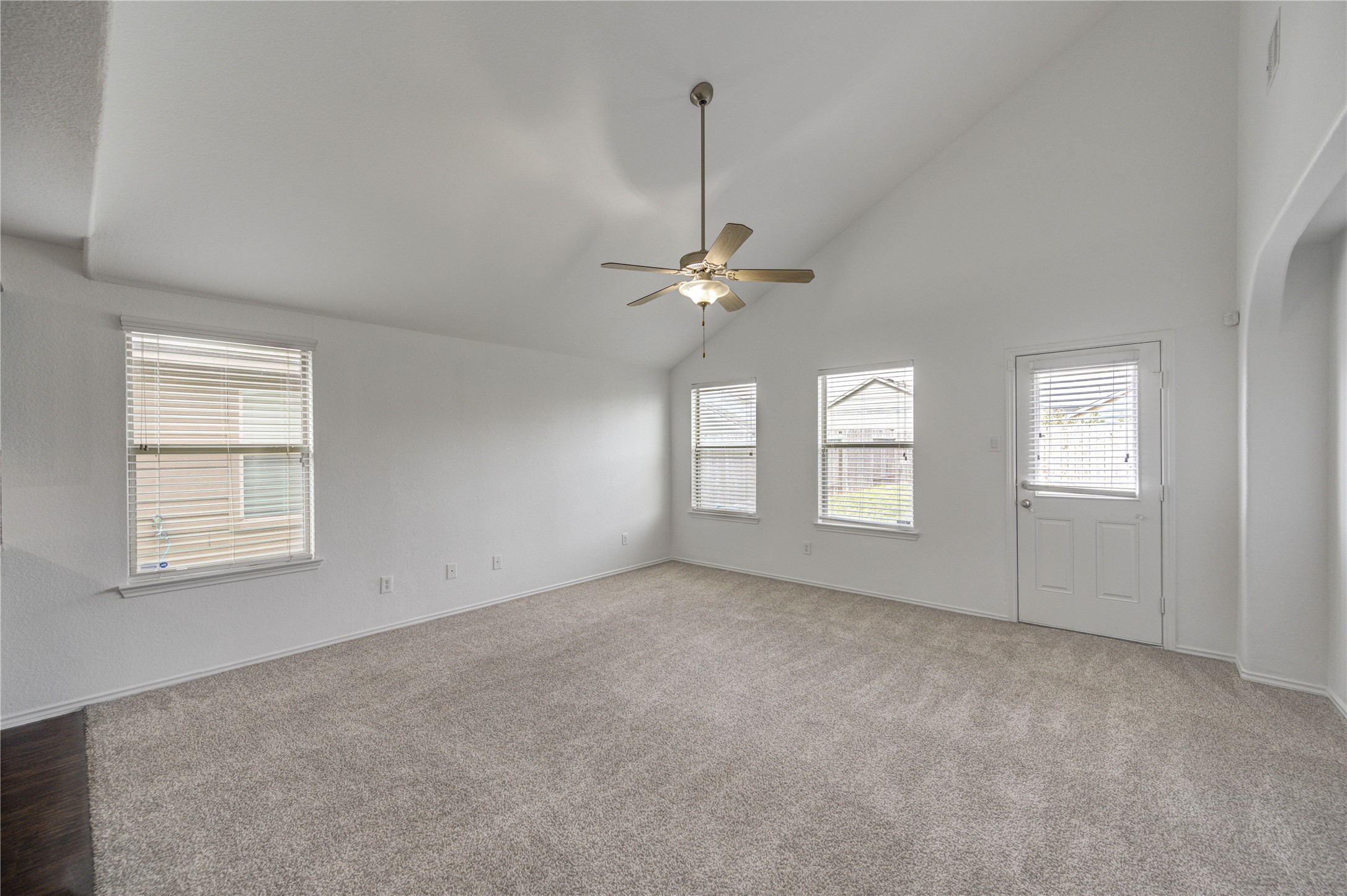 2010 Louetta Stream Way Spring, TX 77388 - Photo 11 of 47 an empty room with windows and fan