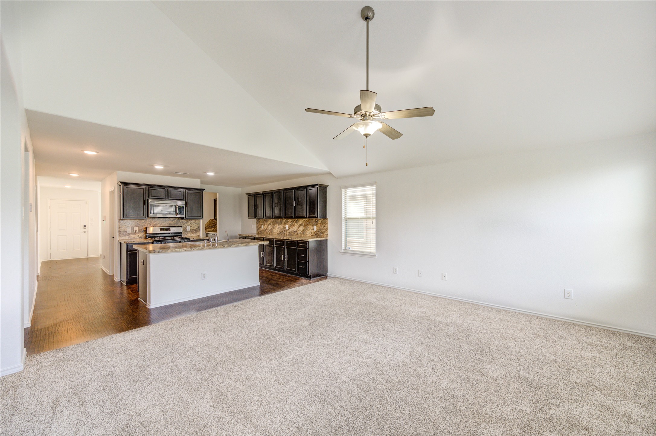 2010 Louetta Stream Way Spring, TX 77388 - Photo 14 of 47 a view of an empty room and kitchen view