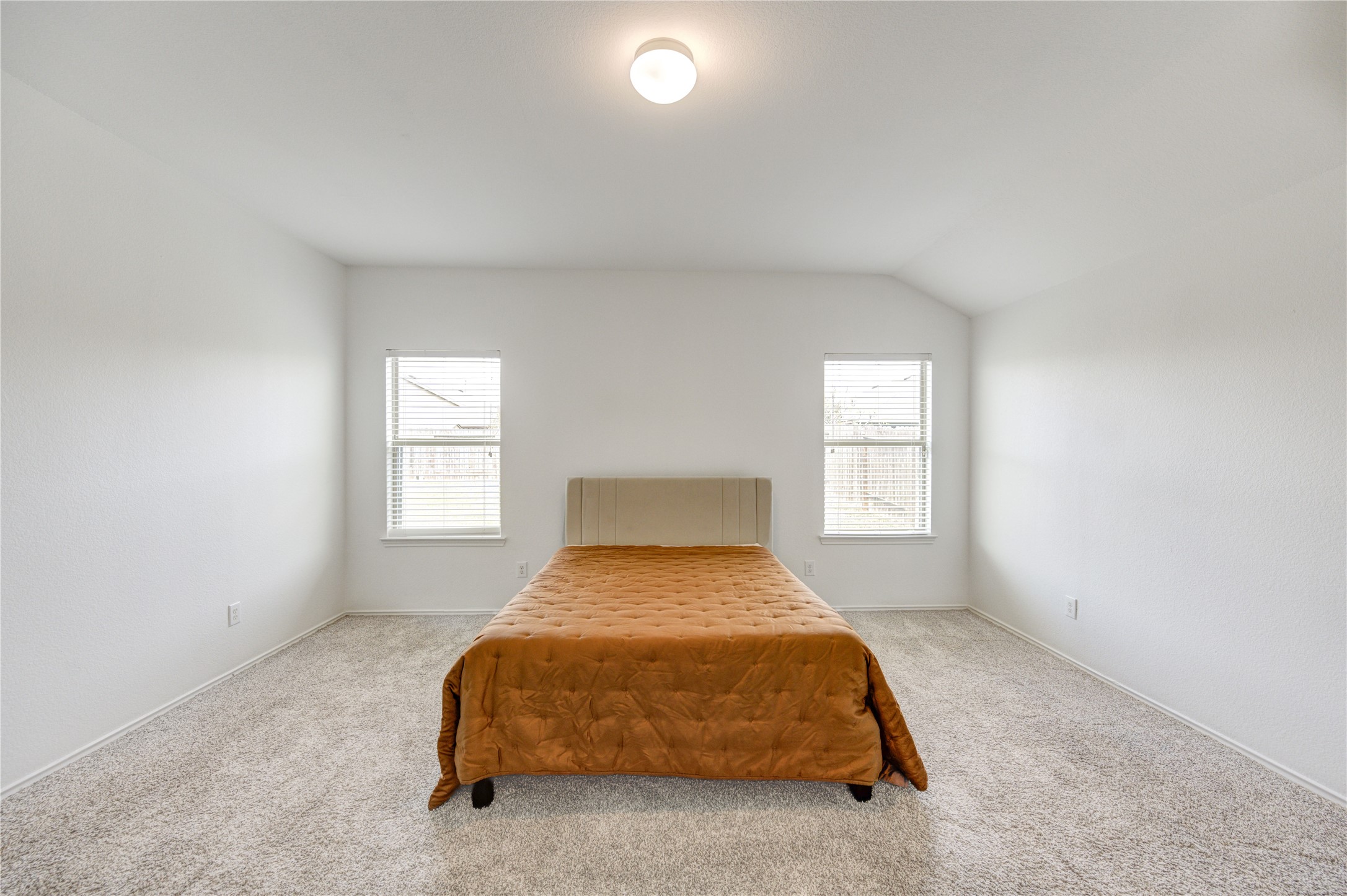 2010 Louetta Stream Way Spring, TX 77388 - Photo 17 of 47 a bedroom with a bed and window