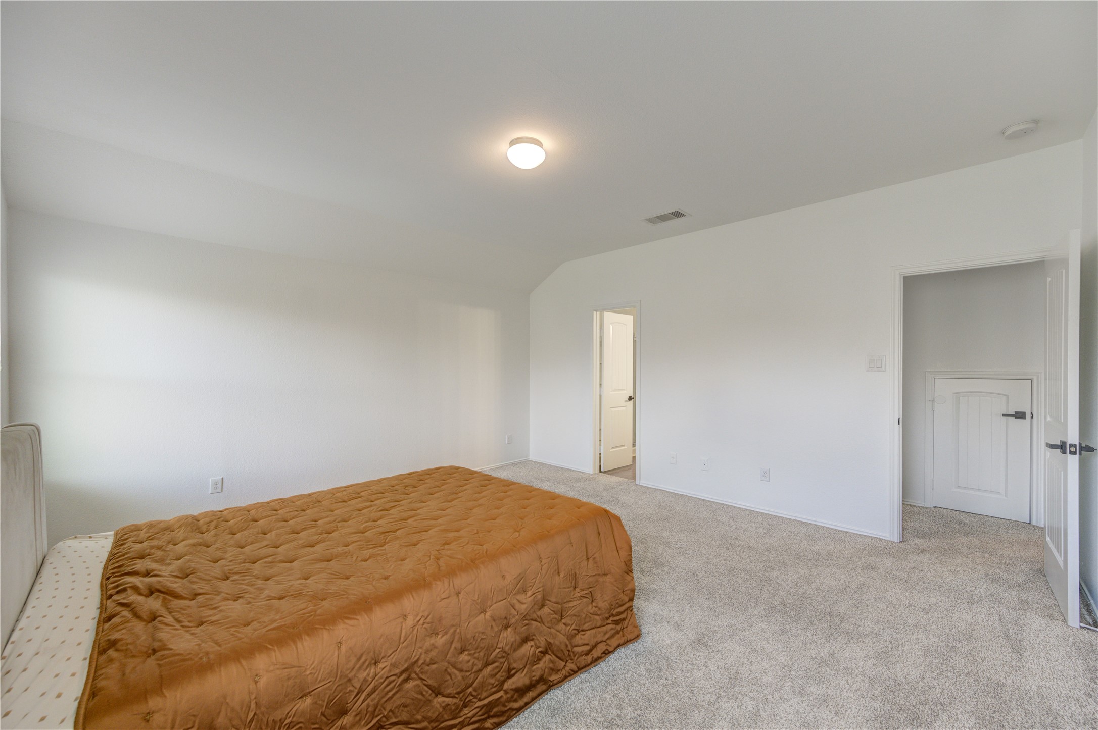 2010 Louetta Stream Way Spring, TX 77388 - Photo 19 of 47 a bedroom with a bed and a night stand