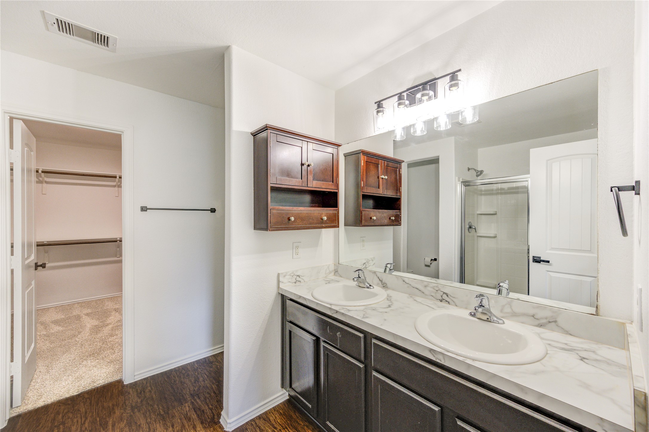 2010 Louetta Stream Way Spring, TX 77388 - Photo 20 of 47 a bathroom with a sink double vanity and a mirror
