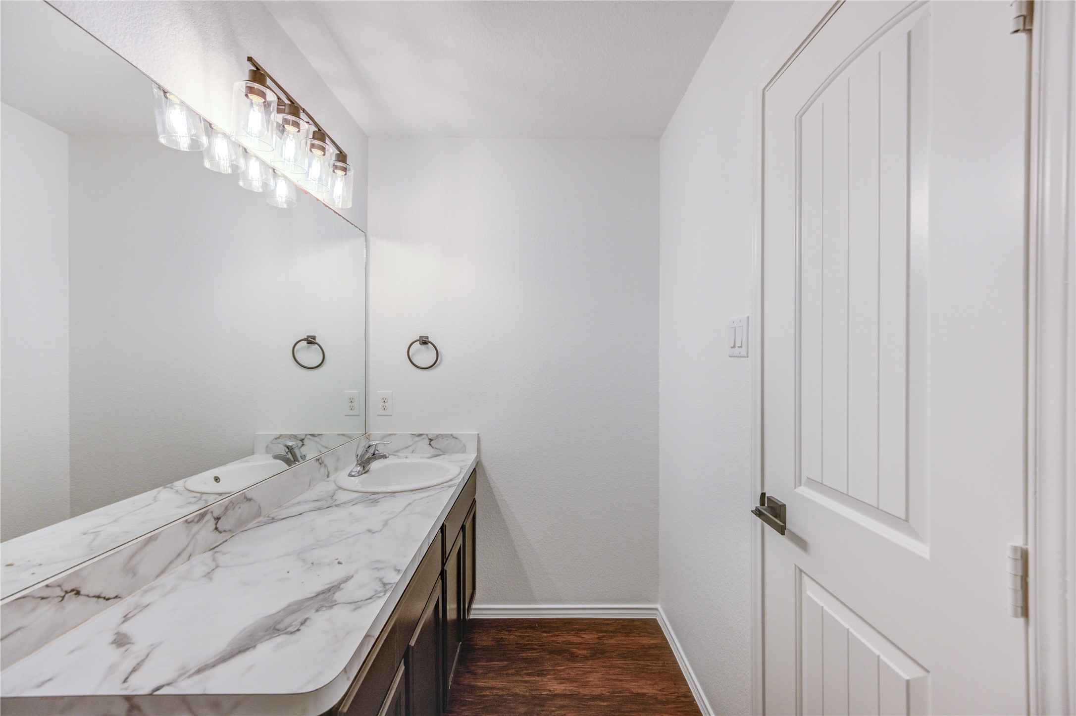 2010 Louetta Stream Way Spring, TX 77388 - Photo 35 of 47 a bathroom with a sink a vanity and a mirror