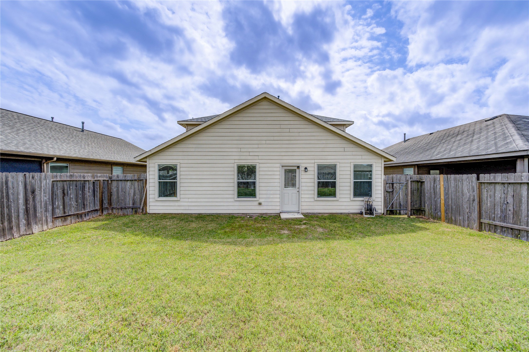 2010 Louetta Stream Way Spring, TX 77388 - Photo 38 of 47 a view of a house with a yard and a large tree
