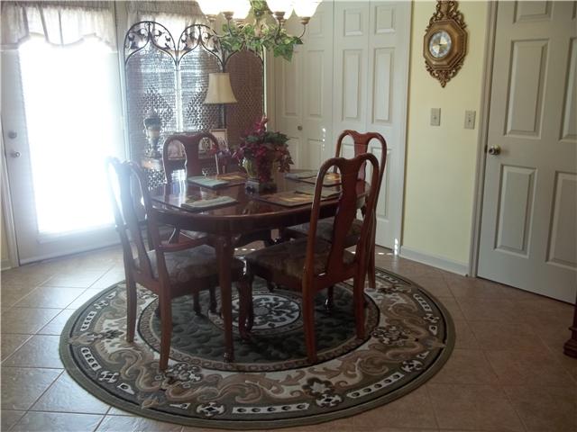809 Hillside Drive Springfield, TN 37172 - Photo 16 of 16 a view of a dining room with furniture window and wooden floor