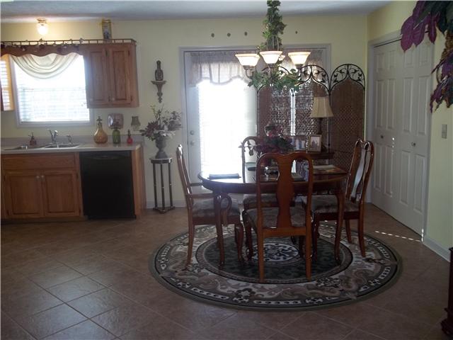 809 Hillside Drive Springfield, TN 37172 - Photo 3 of 16 a view of a dining room with furniture and chandelier