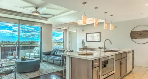 a view of a living room and dining room