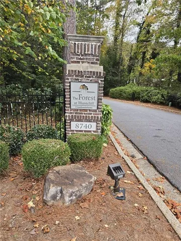 a sign on the side of a road