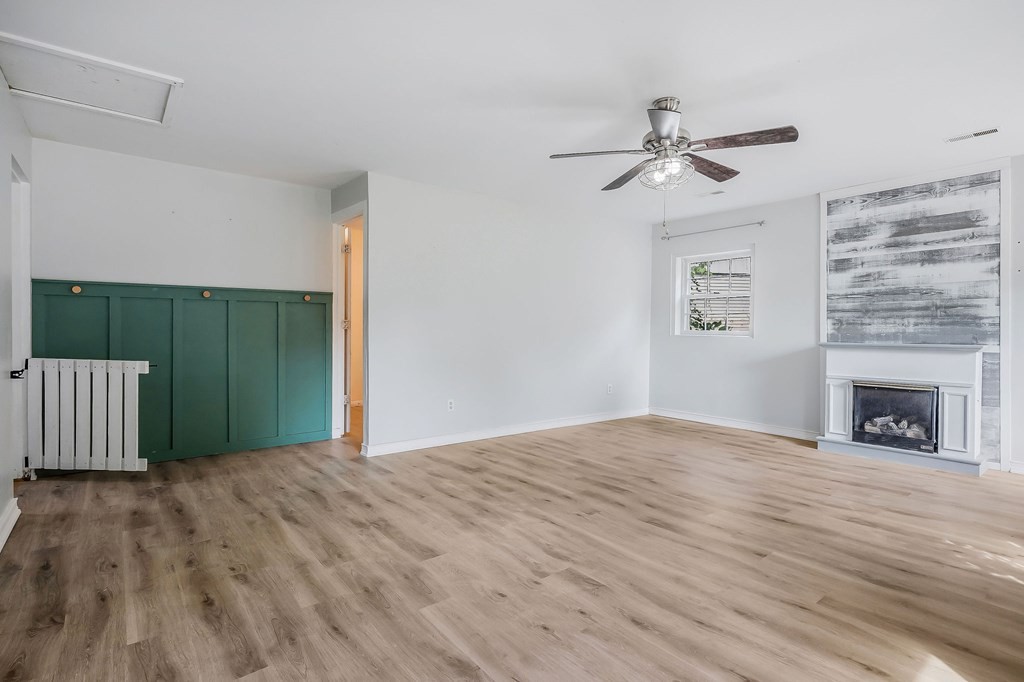 87 Camp Overton Road Rock Island, TN 38581 - Photo 12 of 46 a view of empty room with wooden floor and fan