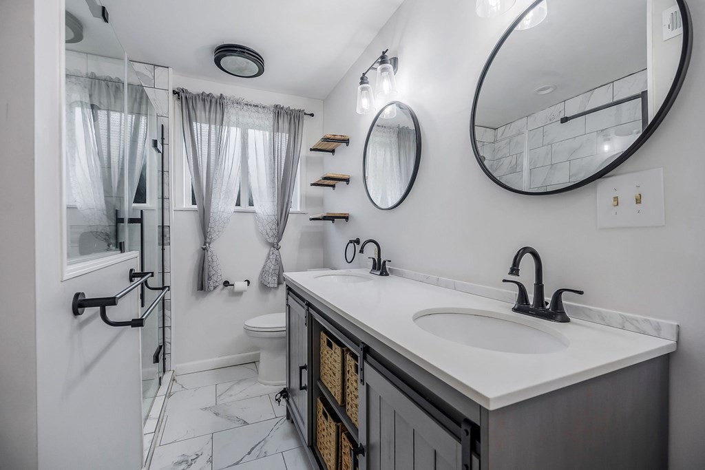 87 Camp Overton Road Rock Island, TN 38581 - Photo 23 of 46 a bathroom with a sink and a mirror