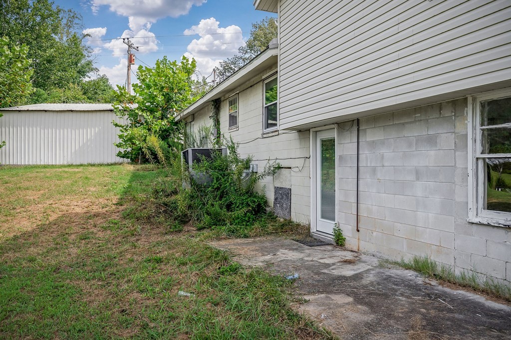 87 Camp Overton Road Rock Island, TN 38581 - Photo 34 of 46 a front view of a house with garden