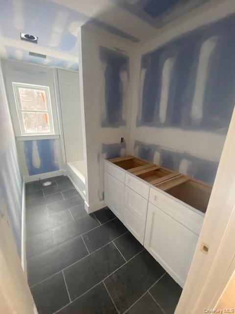 472 Wheeler Road Florida, NY 10921 - Photo 15 of 23 a kitchen with a sink a stove and cabinets