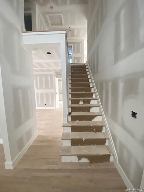 472 Wheeler Road Florida, NY 10921 - Photo 3 of 23 a view of staircase with white walls and windows