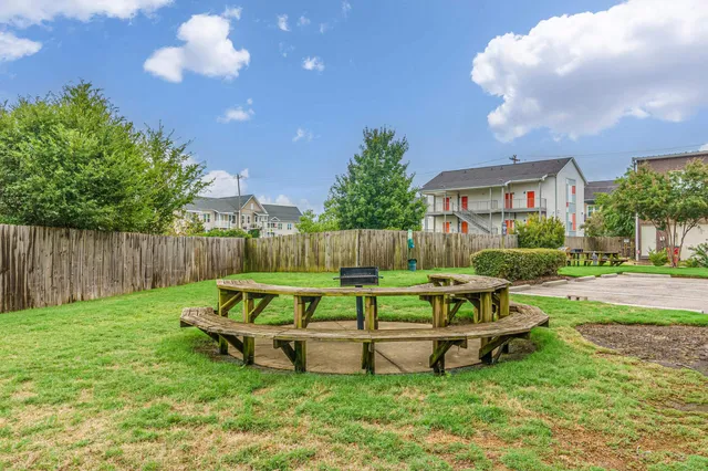 a garden view with a seating space