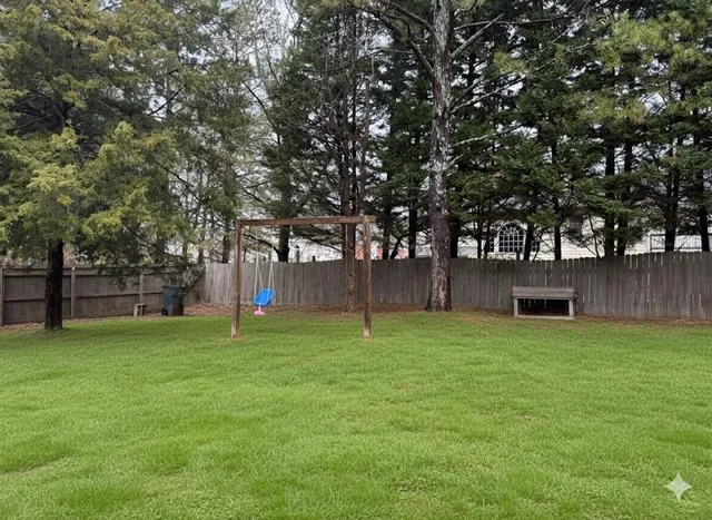 a house with trees in front of it