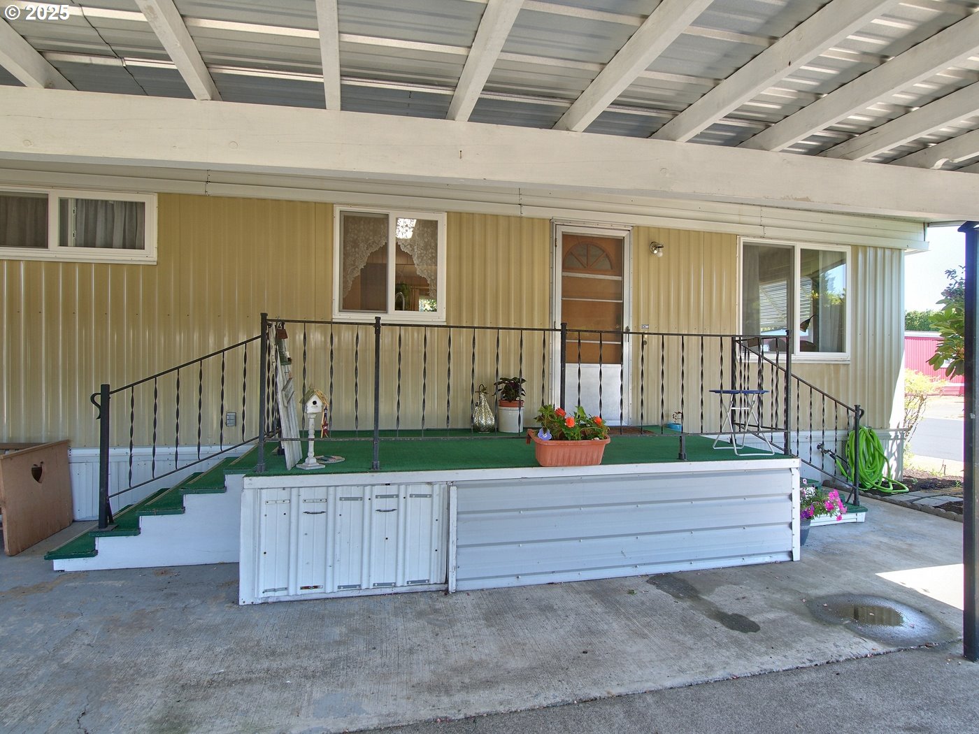 2681 Southeast River Road, Unit 44 Hillsboro, OR 97123 - Photo 12 of 47 a house view with a deck