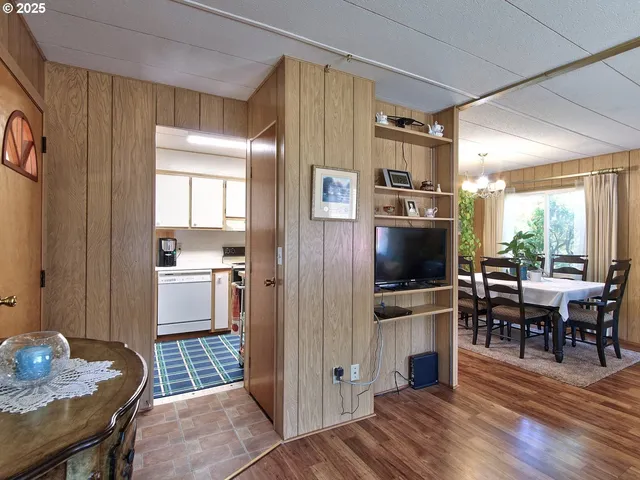 a kitchen with a sink cabinets and window