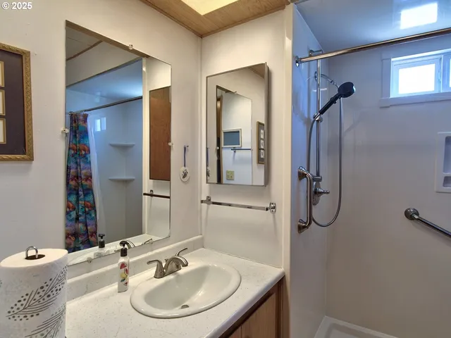 a room with furniture a window and wooden floor