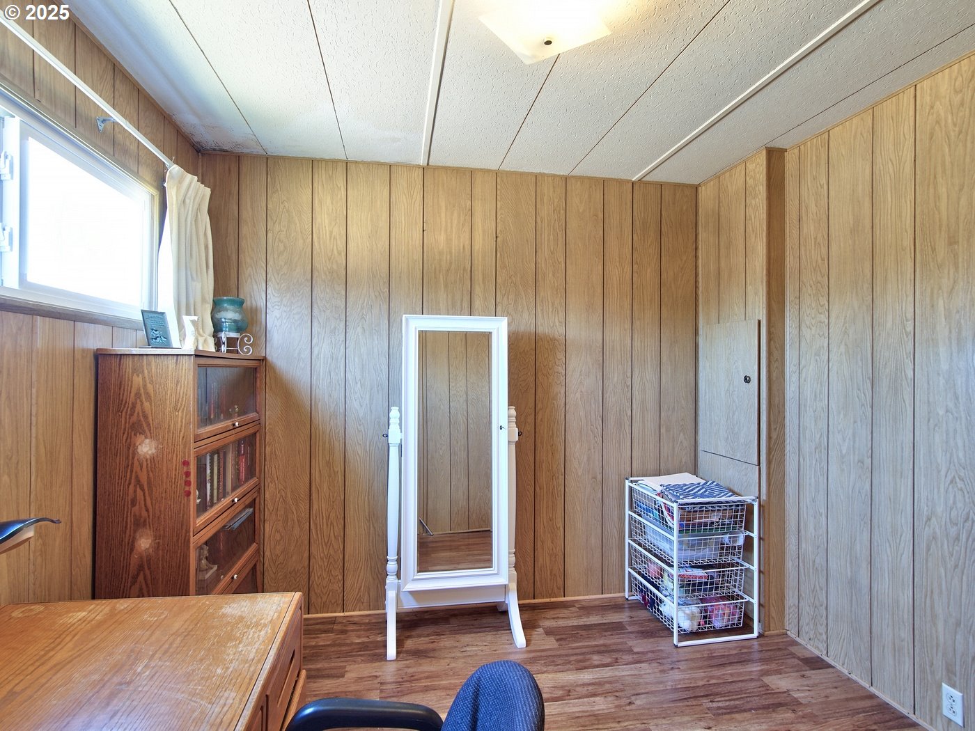2681 Southeast River Road, Unit 44 Hillsboro, OR 97123 - Photo 32 of 47 a view of a bedroom with furniture and windows