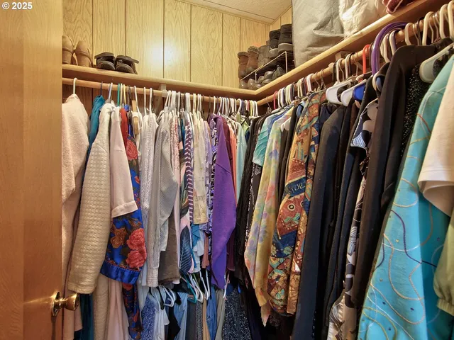 a bathroom with a shower and a glass door