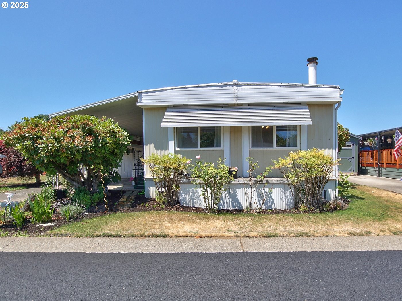 2681 Southeast River Road, Unit 44 Hillsboro, OR 97123 - Photo 6 of 47 a view of a house with a patio