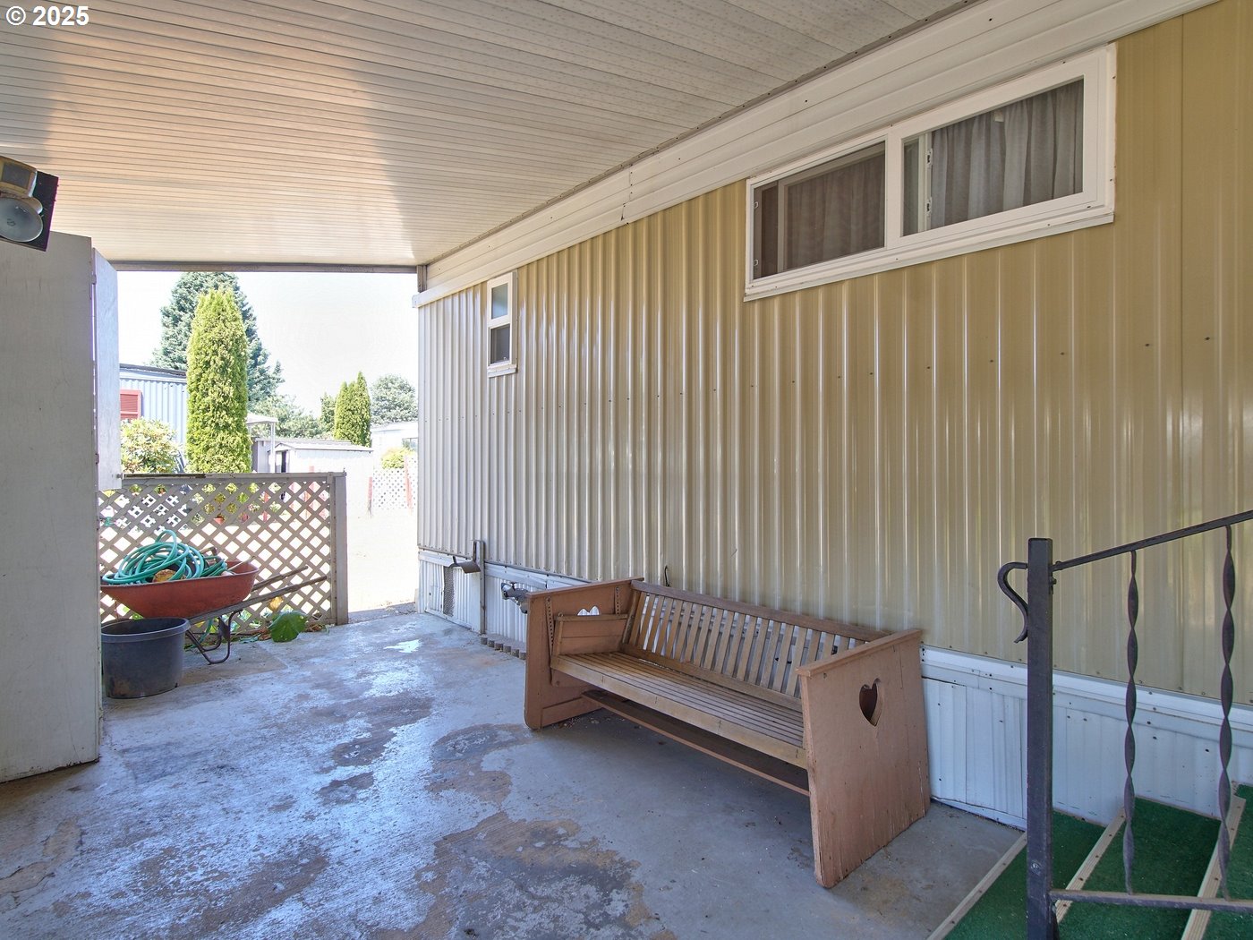 2681 Southeast River Road, Unit 44 Hillsboro, OR 97123 - Photo 10 of 47 a view of a porch with furniture