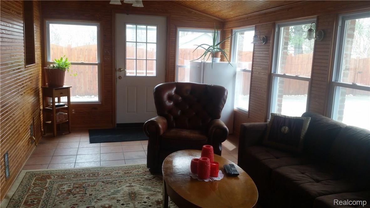 26627 Rialto Street Madison Heights, MI 48071 - Photo 16 of 21 Another Family Room view. Note Lots of Windows for Natural Light PLUS Ceramic Tile Floor.