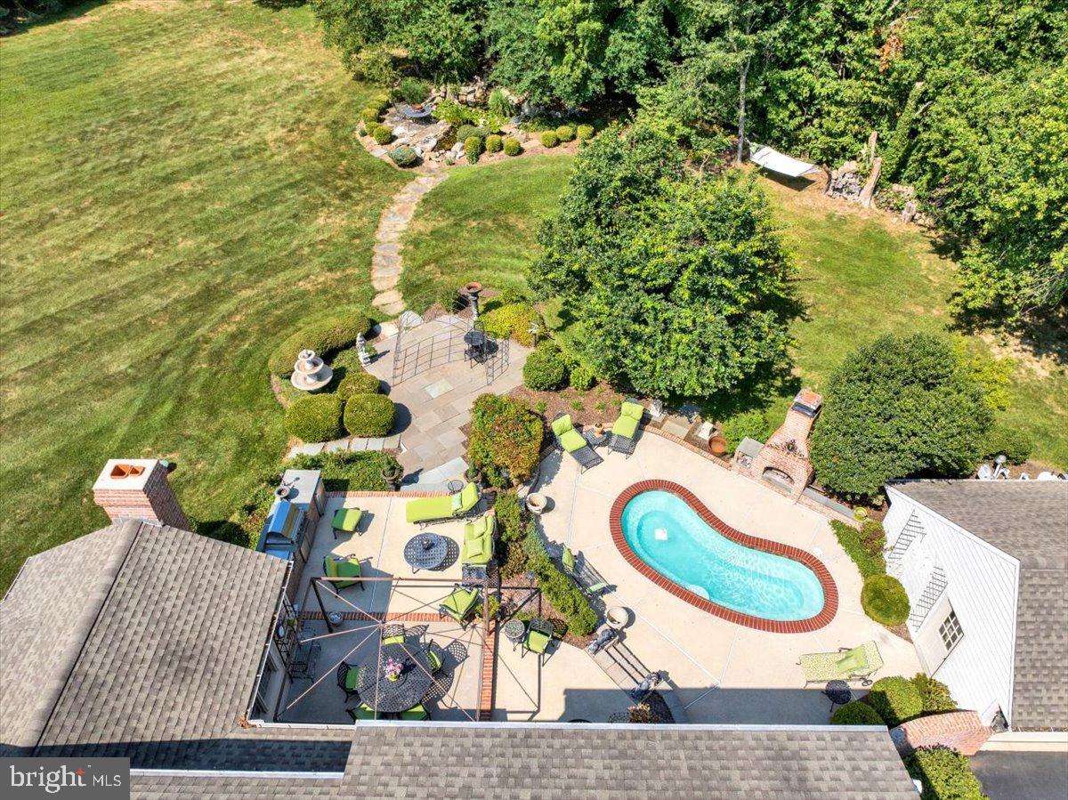 85 Bollinger Road Elverson, PA 19520 - Photo 8 of 87 Serene backyard oasis with inviting pool.
