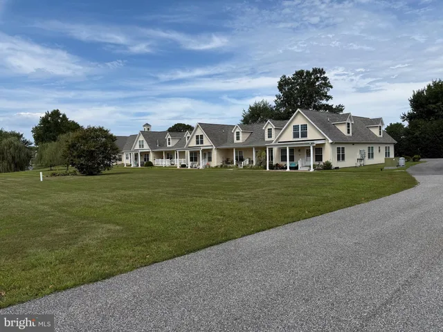 a view of a house with a big yard