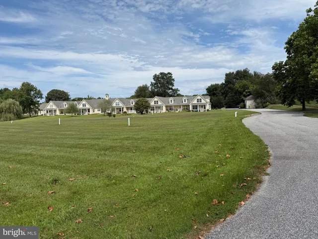 a view of a golf course with a yard