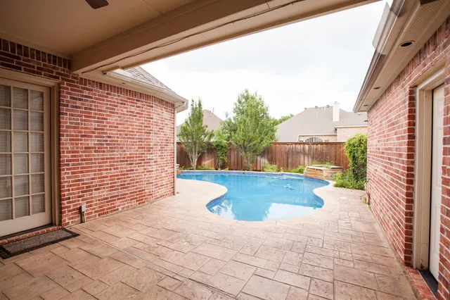 a view of a back yard of the house