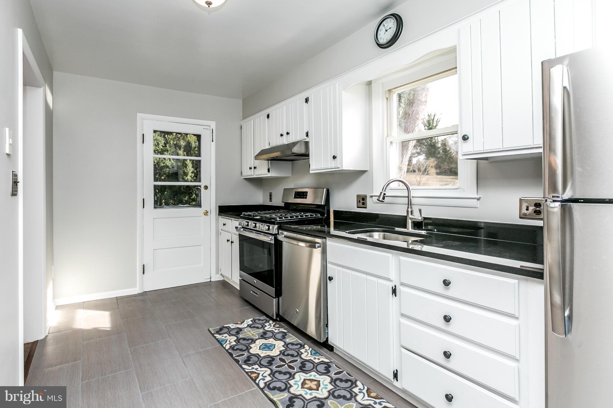 6652 Loch Hill Road Baltimore, MD 21239 - Photo 9 of 30 Custom Granite and ceramic tile flooring-2017!