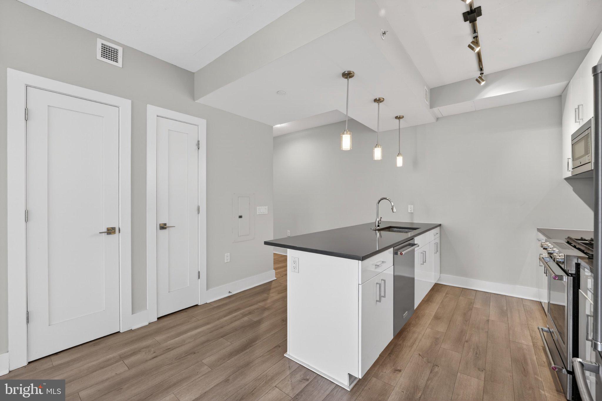 88 V Street Southwest, Unit 213 Washington, DC 20024 - Photo 11 of 26 Modern kitchen with sleek design.