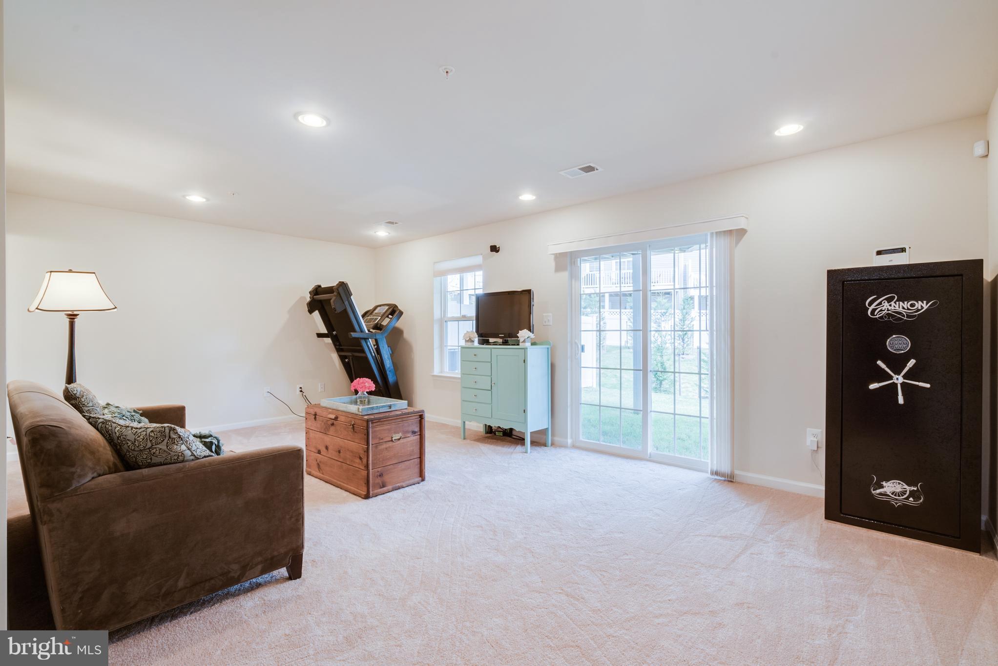 1049 Red Clover Road Gambrills, MD 21054 - Photo 23 of 30 Rec Room opens to walk out area
