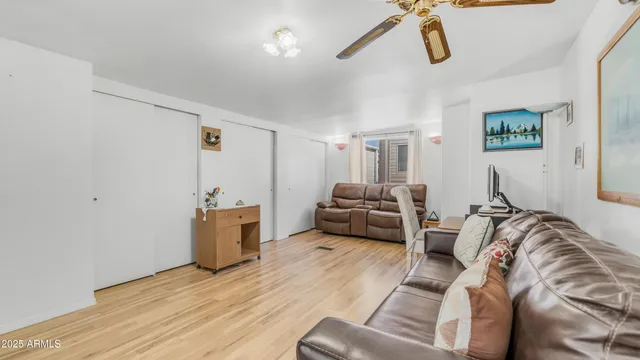 a bathroom with a toilet and a shower curtain